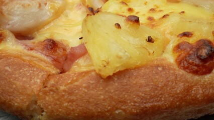 Seafood Sensation: Indulge in a seafood twist with crab sticks, pineapple, and melted cheese on your pizza. Nutrition and appetite concept. Pizza background. 
