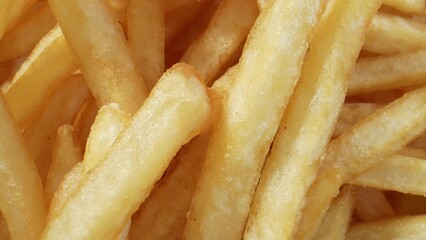 Crispy golden sticks of deep-fried potatoes, French fries are a beloved snack or side dish known for their satisfying crunch and fluffy interior, often seasoned with salt and served hot. 
