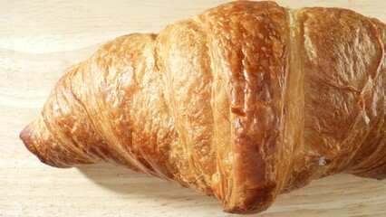 Croissants: Crescent-shaped, but other shapes like straight or curved rolls are common. Enjoyed for breakfast or snack, often with coffee or tea. Junk food concept. Food background. 
