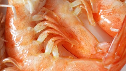 Frozen shrimp with shells: popular, convenient seafood choice. Harvested, cleaned, flash-frozen for...