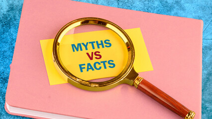 Business, financial and fact vs myth concept. Copy space. Concept words, symbol Fact vs myth on a...