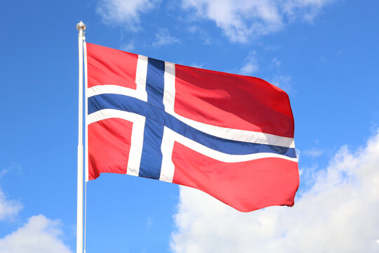 norwegian flag against blue sky