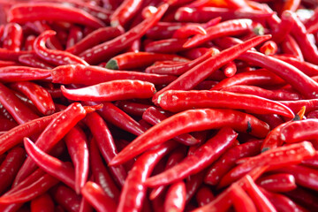 Pattern of red hot chilli peppers for texture and background.