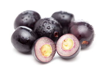 Close-up of 'Indian blackberry' or Jamun (Syzygium cumini) fresh fruits. Isolated on a white background. Top view.