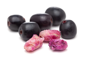 Close-up of 'Indian blackberry' or Jamun (Syzygium cumini) fresh fruits with seeds. Isolated on a white background. Top view.