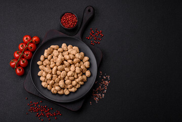 Dry soybean meat pellets, diet food for vegan and vegetarian cuisine