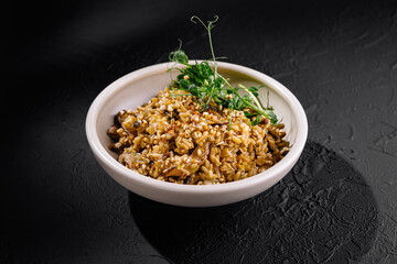 Exotic spiced rice dish on elegant dark background