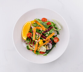 Fresh citrus mixed salad on white background