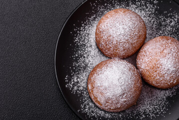 Round homemade cheese donuts glazed with citrus flavor
