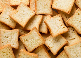 Croutons bread background. Top view