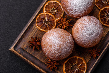 Round homemade cheese donuts glazed with citrus flavor