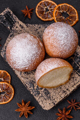 Round homemade cheese donuts glazed with citrus flavor