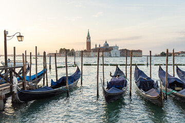 Boats moored up in the Venice canal, Italy