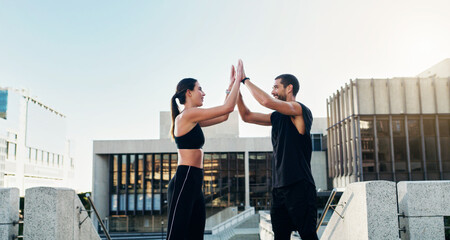 Man, woman and high five in city for fitness, workout and exercise with partnership for training....