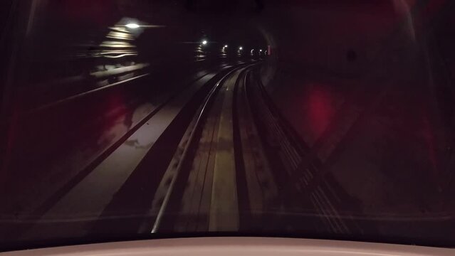 KUALA LUMPUR, MALAYSIA -17th april, 2024: hyper lapse - Font view - Moving in tunnel. MRT, an automated guideway transit service operating along Klang Valley in Kuala Lumpur
