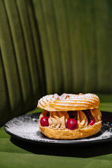 Gourmet paris-brest pastry on elegant plate