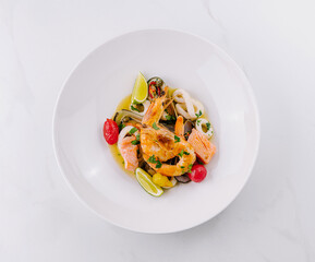 Gourmet grilled salmon dish on marble background