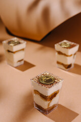 Elegant tiramisu desserts in glass cups