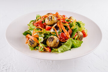 Grilled mushroom salad on white plate