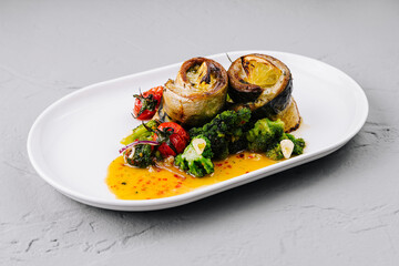 Gourmet grilled vegetables on elegant white plate