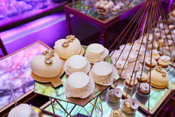 Decor for a wedding or engagement party. Desserts at the candy bar to treat guests