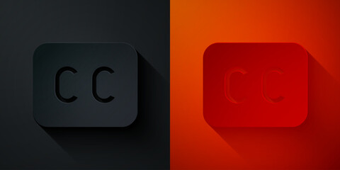 Paper cut Subtitles icon isolated on black and red background. Paper art style. Vector