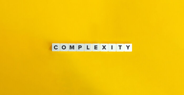 Complexity Term and Word. Text on Block Letter Tiles on Yellow Background.