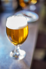 Tulip Glass of Beer on a Bar in Spain During Daytime With Vintage Lens