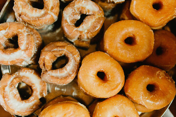 Glazed donuts displayed at event