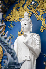 White Buddha statue, at the Blue Temple of Chiang Rai, Thailand