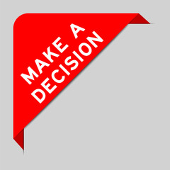 Red color of corner label banner with word make a decision on gray background