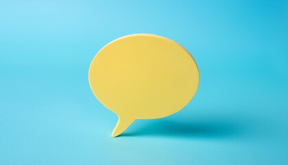 Yellow speech chat bubble on blue background. Social media, online communication. 3D rendering.