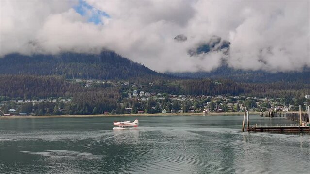 Float plane taking off at Juneau, Alaska, USA