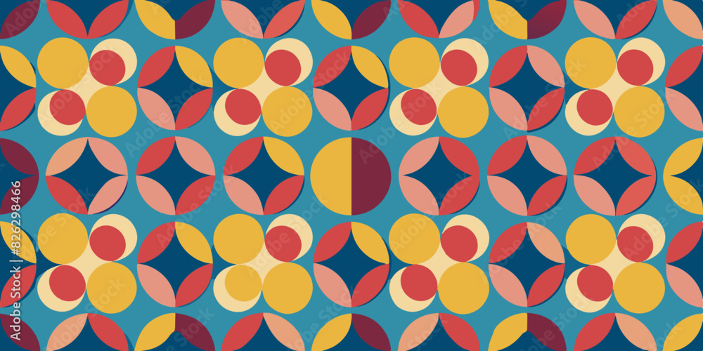 Wall mural A symmetrical geometric pattern with overlapping circles in yellow, red, blue, and pink on a teal background. The design forms flower-like shapes with a retro, mid-century modern style.