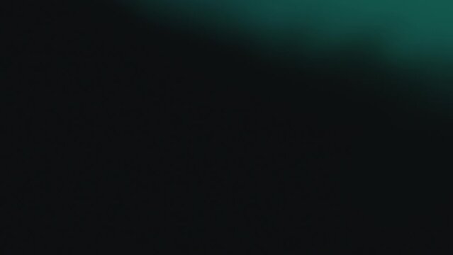 3D illustration of blurry turquoise lights moving seamlessly on black background