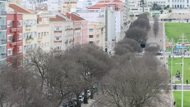 Shot of the landscape over Alameda Dom Afonso Henriques with buildings and the lawn visible.