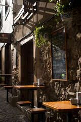 Entrance of a tavern on the street of an old town
