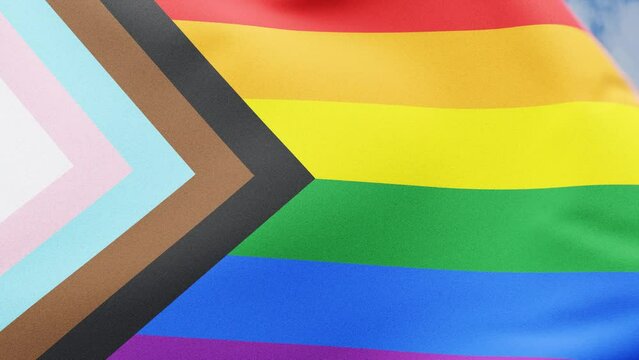 Progress flag LGBT waving in wind