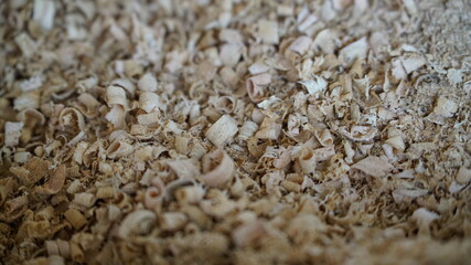 Close-up shot of a pile of wood sawdust shavings