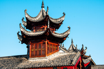 Traditional Chinese brick and wood architecture under sunlight in Wuhan, China.