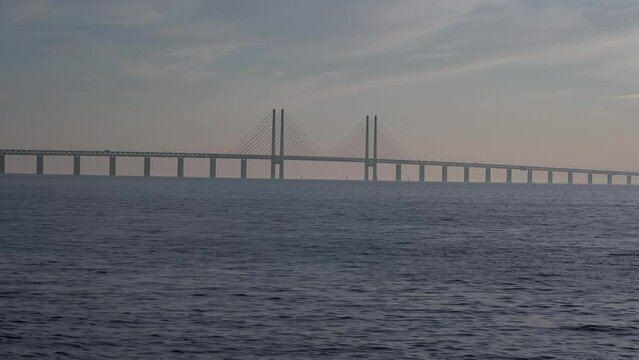 View of Oresund International Bridge at sunset as seen from Malmo City, Sweden