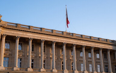 Facade of Palais Brongniart adorned with ornate columns. Paris, France