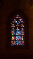 Fototapeta premium Vertical shot of beautiful stained glass windows in the Toulouse Cathedral