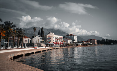 Obraz premium Dramatic clouds over Tivat mountains by Adriatic Sea, Montenegro a