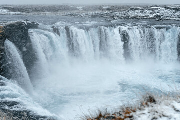 View of the majestic Godafoss Waterfall in winter. Iceland