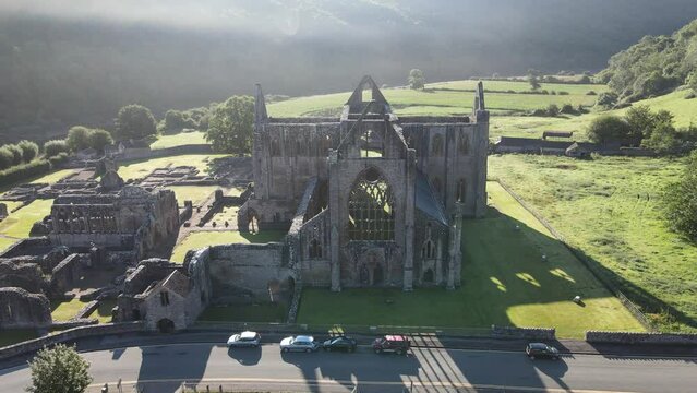 Drone shot of the ruins of Tintern Abbey (Abaty Tyndryn) in Tintern village, Monmouthshire, Wales