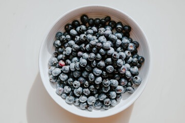 Fresh blueberries in a bowl on a table