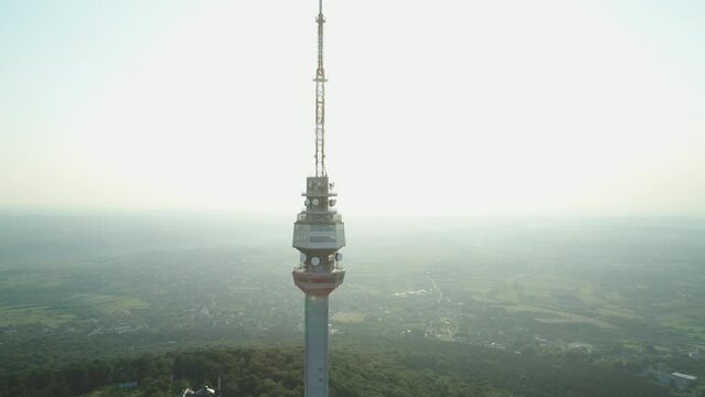 Drone shot of the Avala Tower at sunset, located on Mount Avala in Beli Potok town, Belgrade, Serbia