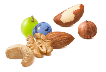 Brazil nut, walnut, hazelnut,  almond, cashew and grapes isolated on white background. Diagonal...