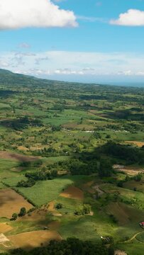 Aerial view of farmland and agricultural fields at the foot of the volcano. Negros, Philippines